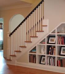 Here is how the foyer and staircase looked when we first moved into the house. 20 Ways To Turn Stairs Into An Amazing Bookshelf Library