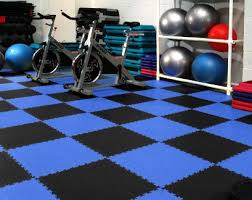 One option for home gym flooring is to use rubber on a roll, like this tough mat from incstores. Home Gym Flooring Buyer S Guide
