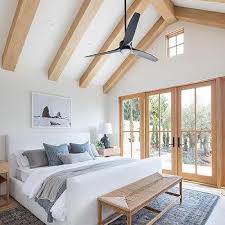 wood beams on vaulted bedroom ceiling