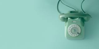 A Green Vintage Dial Telephone With