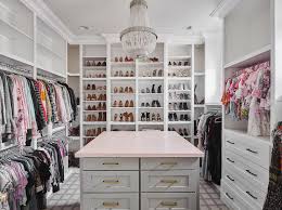 gray closet island with pink countertop