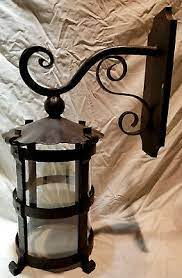 heavy 1920s style hammered wrought iron