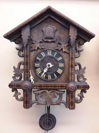 antique cuckoo grand strand clock