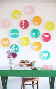 A Colorful Wall Of Diy Painted Plates