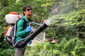 backyard mosquito spraying booms but