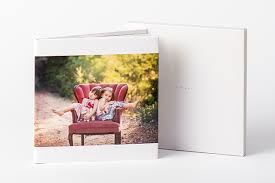 When i first started making photo books, i always made the 8x8 size because they're cheaper and shutterfly often has free 8x8 book. Zen Layflat Ex