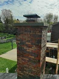 Layman Masonry - The old chimney cap was cracked badly and... | Facebook
