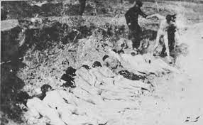 A naked prisoner is led to an execution site, possibly at Ponary, where  others either have been shot already or forced to lie face down prior to  being shot. - Collections Search -