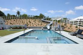 Without a doubt, the addition of any custom designs can increase the cost, such as an over the ground lap pool, elongated shape, etc. How Much Will Luxury Swimming Pool Builders Cost California Pools