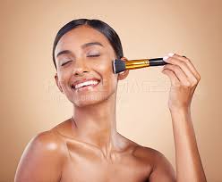 happy woman brush or makeup artist