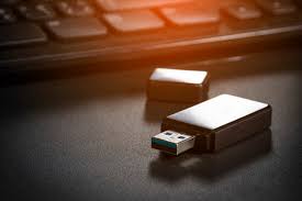 Usb Flash Drive And Memory Card Above Computer Place On