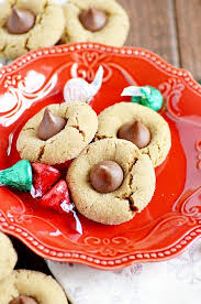 These hershey's kisses shortbread cookies can be made with any type of hershey's kiss, but i prefer hugs because they give you a bit of both worlds. Gingerbread Blossoms Recipe Something Swanky
