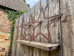 Set Of 3 Rusty Hollow Stars Wall Art