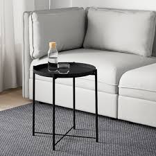 The table offers a spacious working space on its top. Gladom Tray Table Black 17 1 2x20 5 8 Ikea
