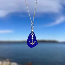 sea gl with tiny anchor necklace