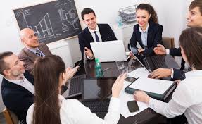Positive Business Team Discussing Project At Corporate Meeting.. Stock Photo, Picture And Royalty Free Image. Image 85129680.