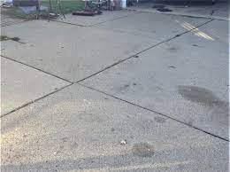 ed concrete driveway repaired in