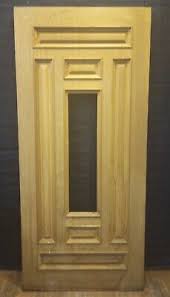 exterior wooden door with 1 lite center