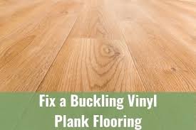 fix a buckling vinyl plank flooring