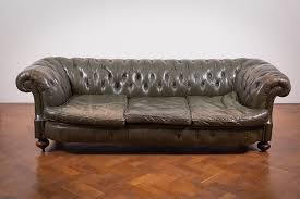lot 19 19 by a chesterfield sofa