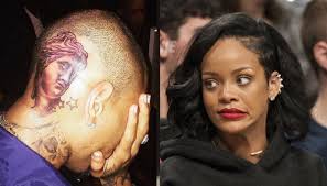 Chris brown's new tattoo looks like the face of a battered woman. Rihanna Disappointed With Chris Brown New Tattoos Calls It A Poor Decision