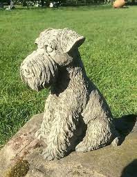 Stone Garden Sitting Schnauzer Dog