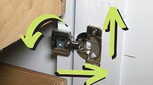 how to adjust cabinet door hinges