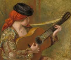 young spanish woman with a guitar