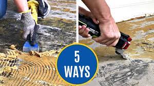 remove adhesive on concrete floor