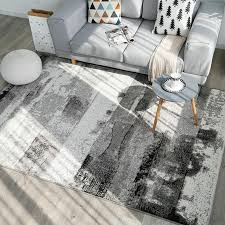 brush paint black gray rug large area