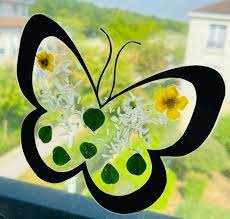 Bricolage papillon pour enfant en avant les fleurs - Kreakids