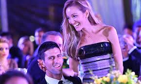 Could someone please teach novak djokovic's wife how to wear the mask that's hanging off her face? Novak Djokovic Latest News From The Serbian Tennis Player Hello