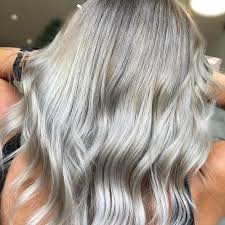 Styles that add some texture and structure look especially glamorous with wavy hair. The Coolest Way To Get Gray Blonde Hair Wella Professionals