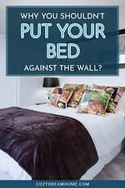your bed against the wall