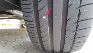 how to deal with nail in car tire q