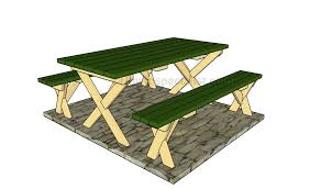 A Picnic Table With Separate Benches
