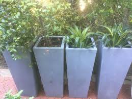 Four Attractive Gray Garden Pots Pots