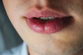 natural big lips men close up stock