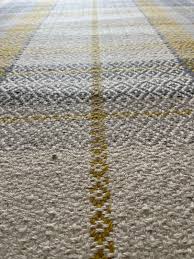 yellow tartan rug by next home