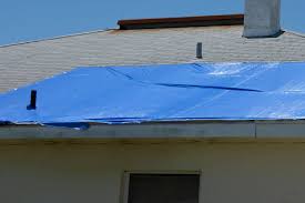 how to tarp a roof step by step guide