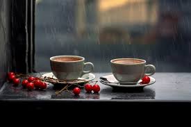 two cups of coffee in the rain with red