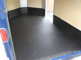 trailer and trailer floor coating