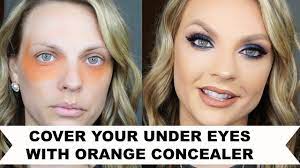 under eyes with orange concealer
