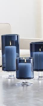 Give your home a style upgrade with striking decorative accessories that are sure to make your home pop. London Blue Hurricane Candles Blue Home Decor Decorating Tips Decor Homedecor Blue Home Decor Navy Blue Decor Blue Living Room