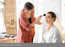 professional makeup artist working with