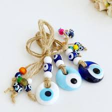 Trendy evil eye necklace and evil eye bracelet designs. Tiny Evil Eye Wall Hanging Blue White Evil Eye Bead Evileyefavor