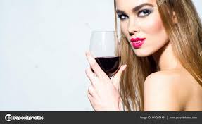 pretty with red lips drinking wine
