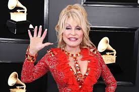 dolly parton says she s too gaudy to be