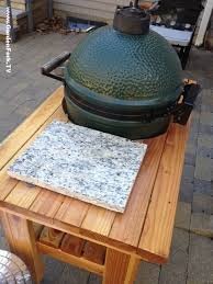 The cedar countertop is sealed to with exterior grade sealer to make it easy to wipe down after use. 6 Diy Big Green Egg Table Projects Shelterness