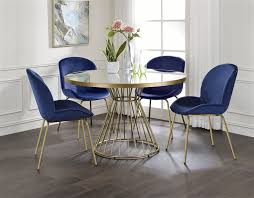 Imagine family dinners seated around a cozy, traditional set, or visualize modernizing your living space with a chic contemporary discount dining room set. Chuchip 5 Piece Round Table Dining Room Set With Blue Velvet Chairs By Acme 72945 72947